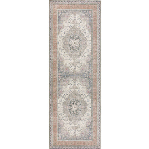 A vintage-inspired rectangular washable rug with a faded eterna medallion design in muted grays and dusty rose tones