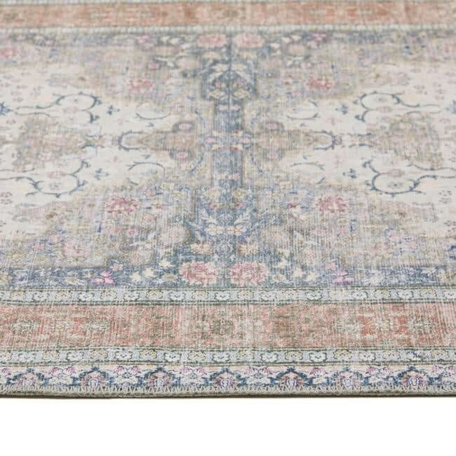 Antique-style washable rug with eterna medallion design in faded pastel pink blue and beige woolen texture
