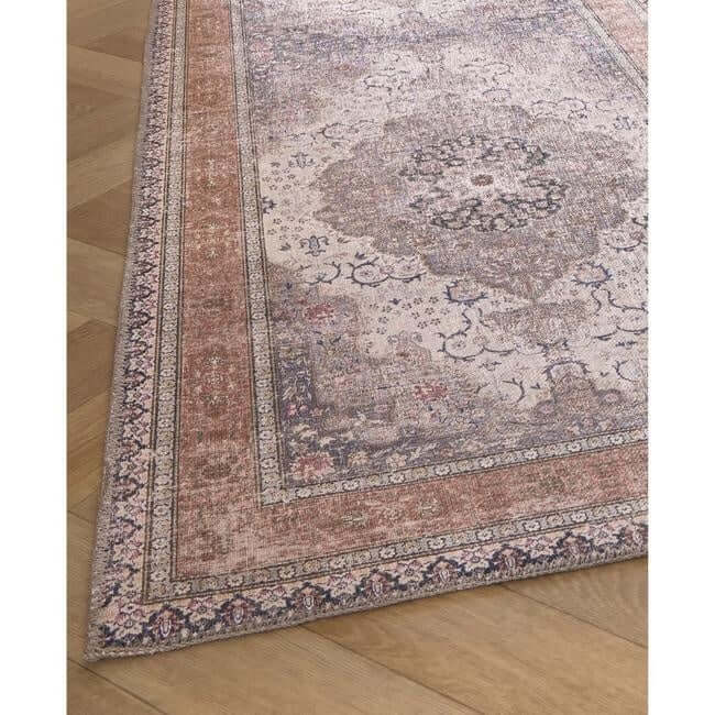 Vintage-style washable rug with eterna medallion design in muted beige gray and dusty rose with floral border