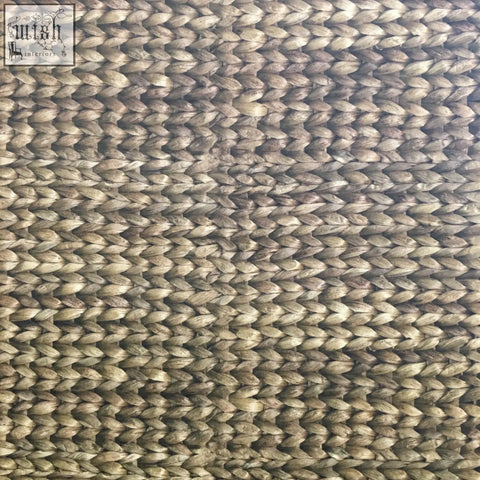 Natural woven rug with a textured interlaced pattern in earthy beige and brown tones perfect for water hyacinth horizontal wallpaper decor