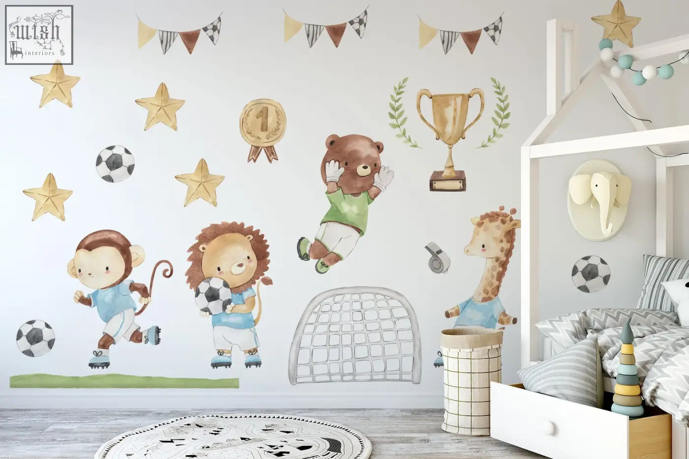 Gold star wall decals complement watercolor football animals featuring a lion playing soccer for kids room decor