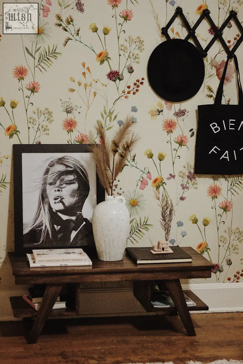 White textured ceramic vase with dried pampas grass in a living space featuring watercolor wild flower wallpaper peel and stick by clickwalls