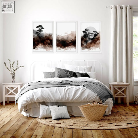 Woven natural fiber basket with handle next to japanese landscape watercolour paintings set of three prints wall art