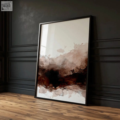 A modern abstract watercolour painting with deep brown and beige swirls in a sleek black frame from a set of three prints