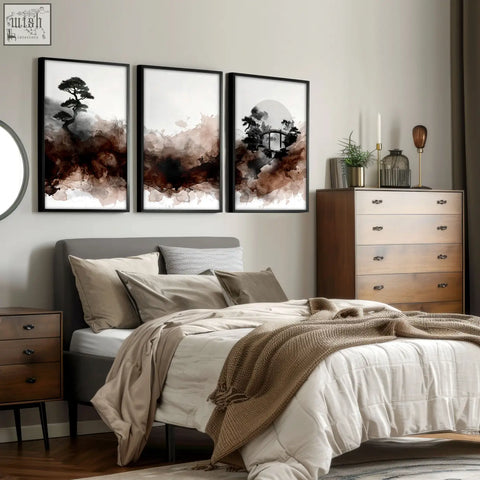 Three framed watercolour paintings featuring a japanese landscape with earthy brown bonsai trees and mist in black frames
