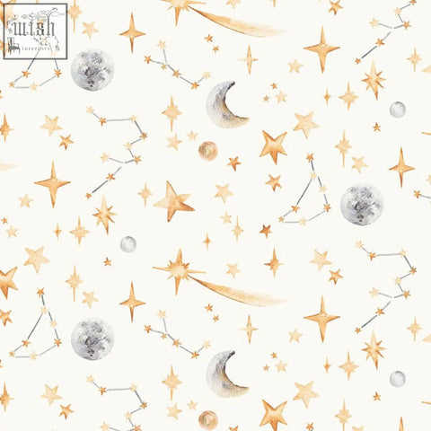 A delicate watercolour stars and constellation wallpaper with glowing stars and silver moons on a cream night sky background