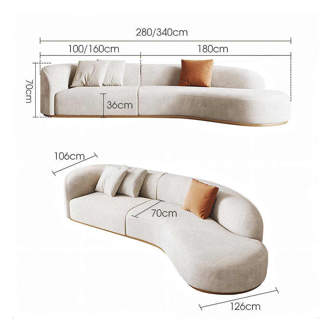 Cream-colored welby three seater curved sofa with soft velvet finish and light wood base for elegant living spaces