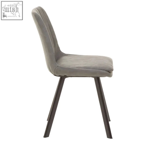 Gray upholstered dining chair with sleek black metal legs from westford rectangle dining table with 6 chairs set