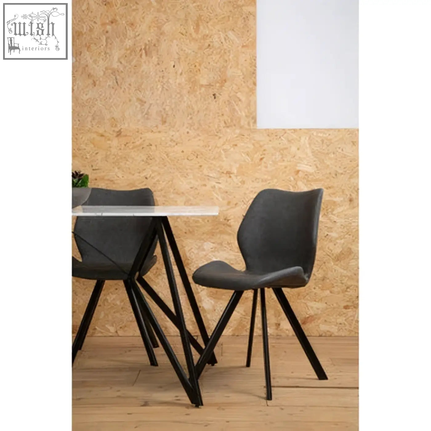 Modern black upholstered dining chair with sleek metal legs as part of weston marble effect 7pc dining set features