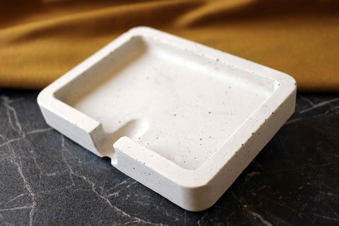 White concrete soap holder with speckled texture and rectangular design perfect as a concrete soap holder or ashtray
