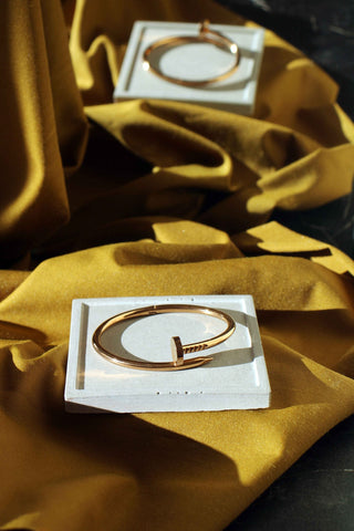 White concrete square jewellery holder with a rose gold needle clasp bangle handmade concrete great gift idea