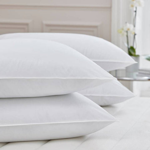 White duck down white cotton pillowcases with crisp edges and subtle sheen for a comfy sleeping style