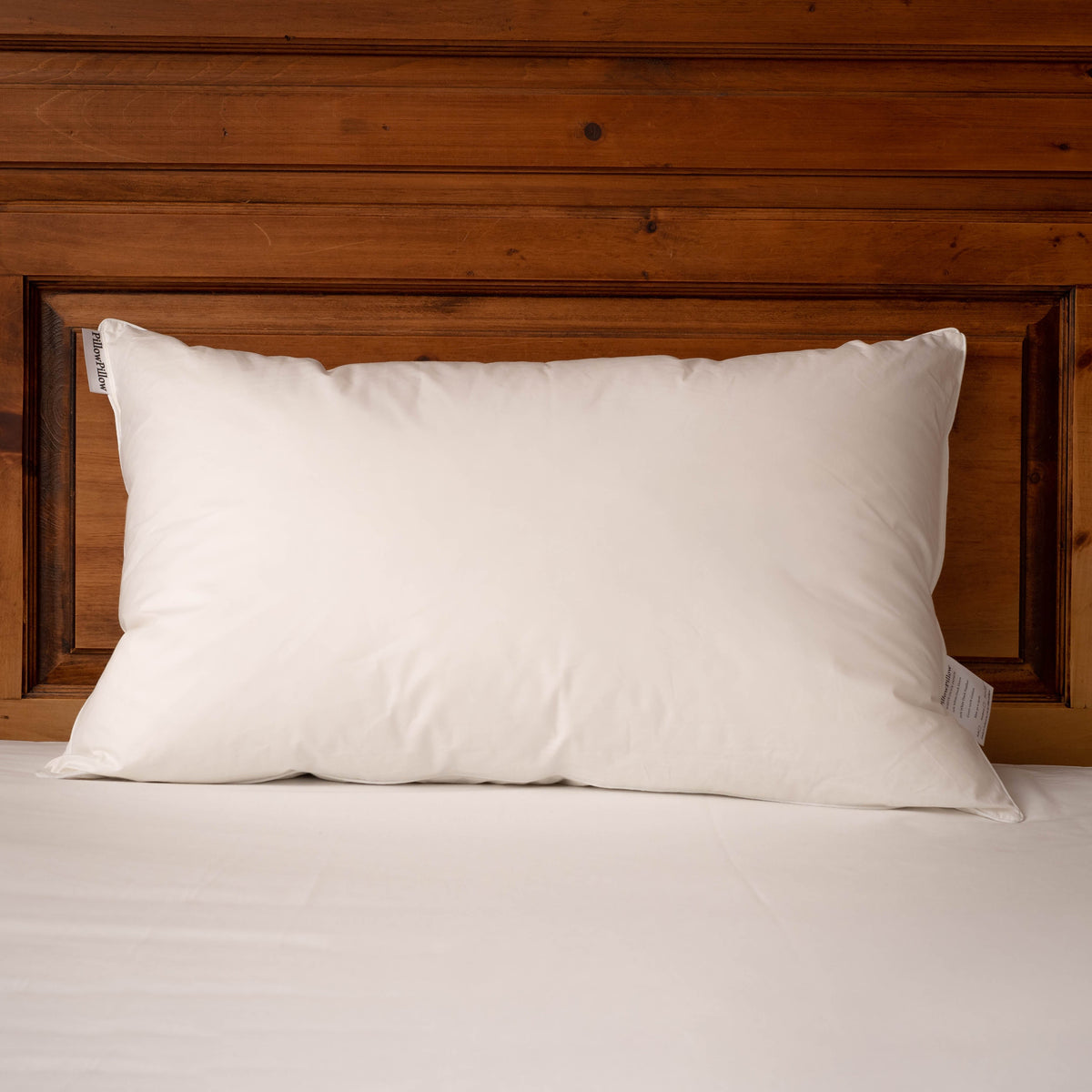 White duck down pillow with a smooth soft fabric cover perfect for a cozy sleeping style