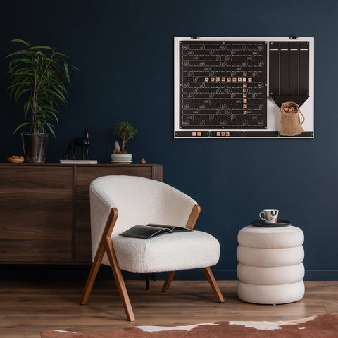 Cream-colored plush armchair with wooden legs and modern design perfect for players of the white words wall game age range