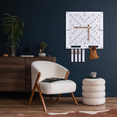 White upholstered armchair with wooden legs for good-feeling social play with the player in family age range