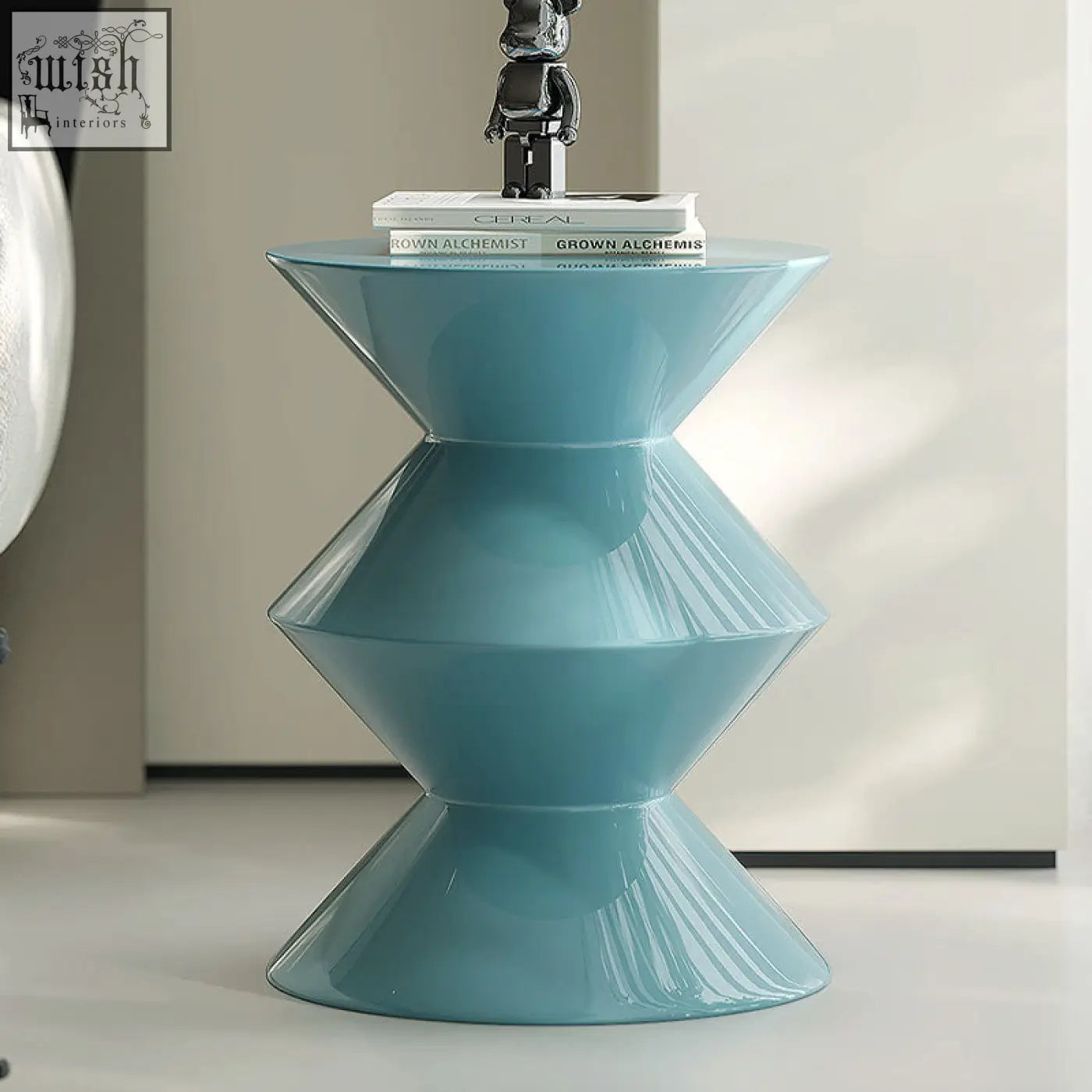 Willa side table blue is a sleek light blue ceramic table with modern geometric design and radial grooves protection sheet friendly