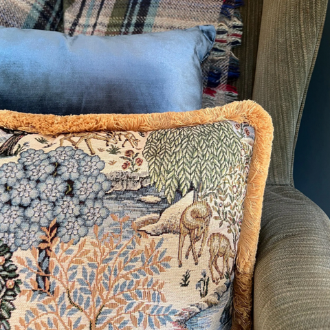William morris deer garden tapestry cushion with muted blues greens earth tones and mustard gold 30mm fringe