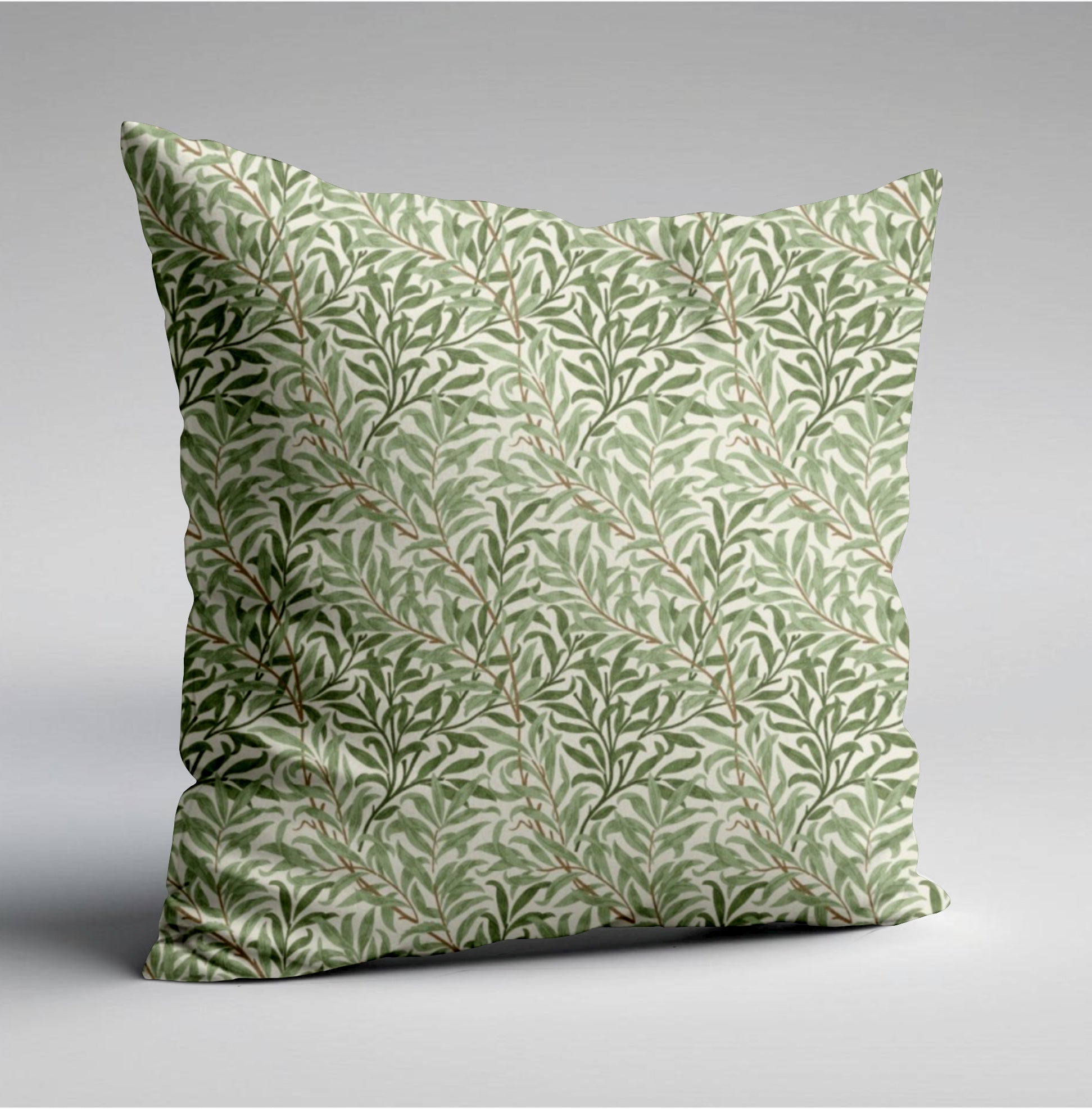 Square cotton throw pillow with william morris green willow leaves pattern on pale cream background
