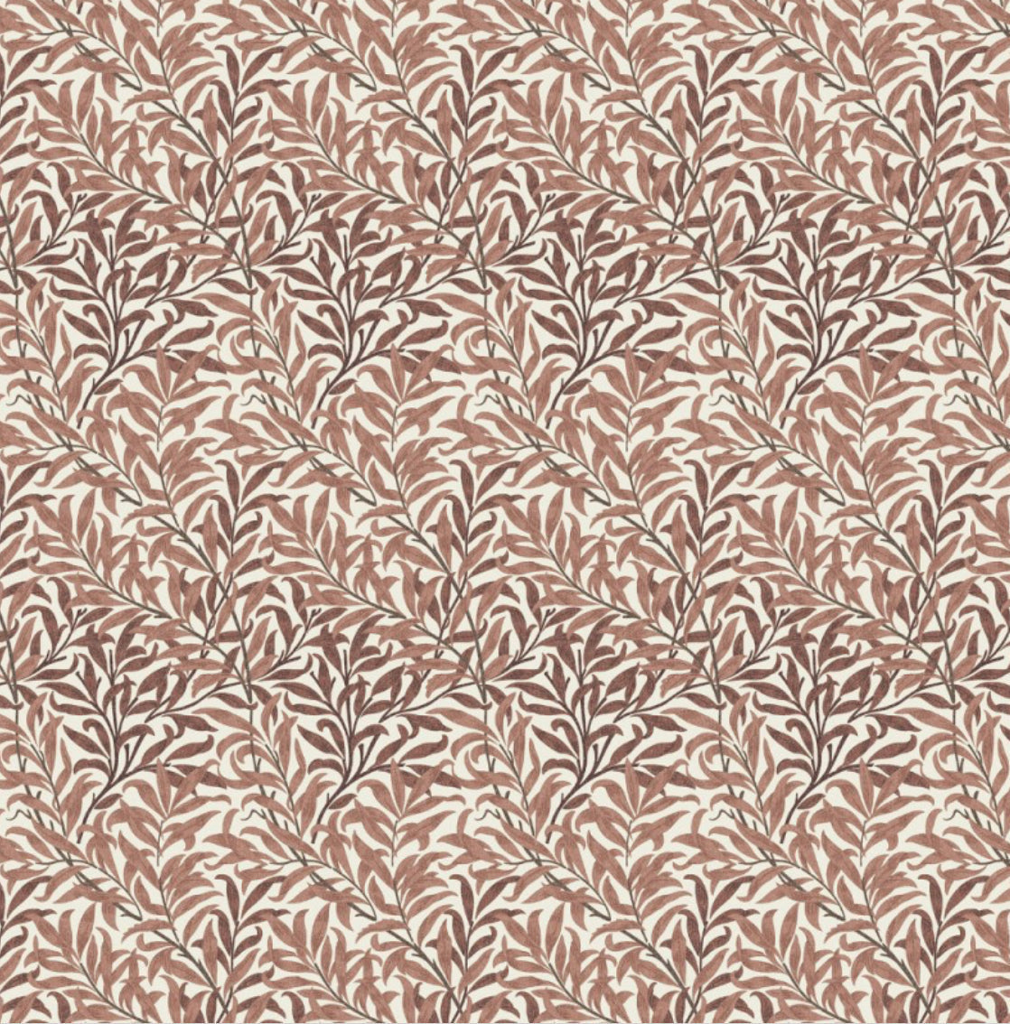A william morris rust cotton cushion with rust willow leaves pattern in terracotta and dark brown on cream background