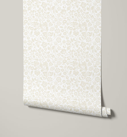 A roll of willow wallpaper in off-white with a delicate cream floral and vine pattern perfect for elegant decor