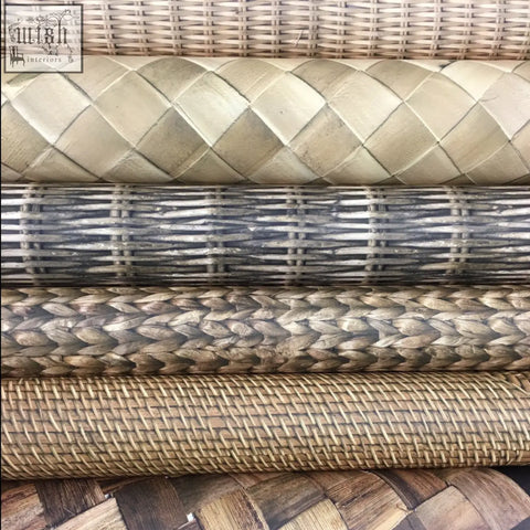 Stacked rolls of woven rattan in natural tones with intricate patterns for willow wallpaper check shipping times online