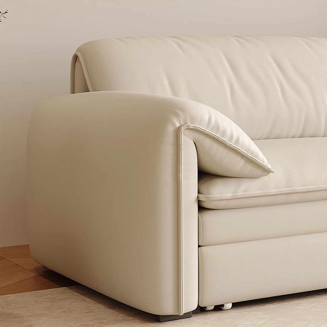 Cream-colored leather wilson single seater with clean lines and stitching two seater sofa bed with storage