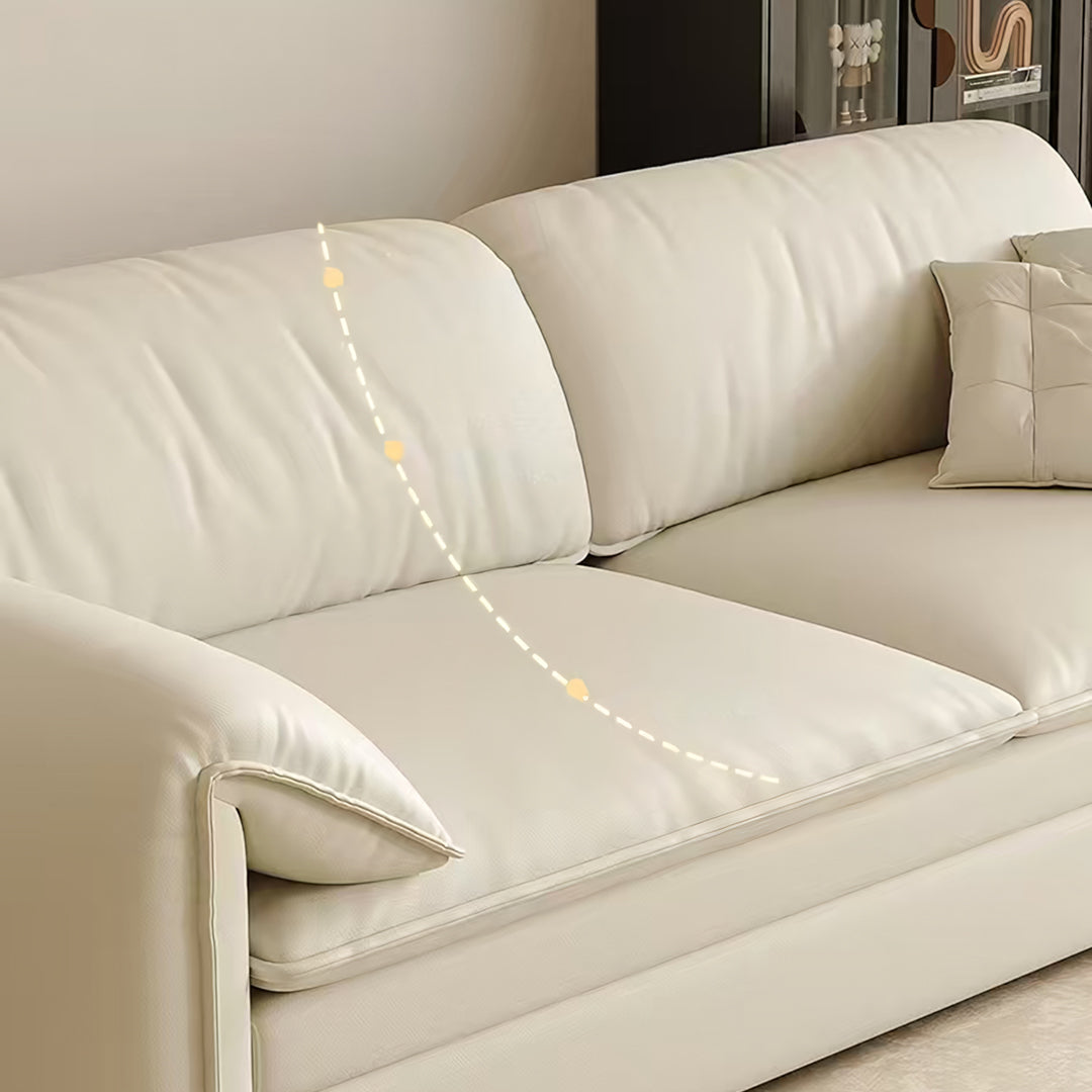 Cream-colored leather wilson single seater two seater sofa bed with clean lines plush cushions and storage