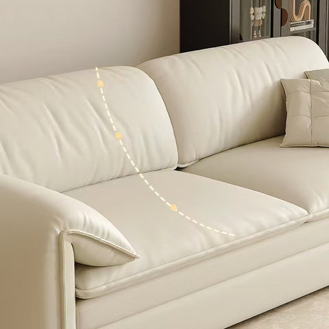 Cream-colored leather wilson single seater two seater sofa bed with clean lines plush cushions and storage