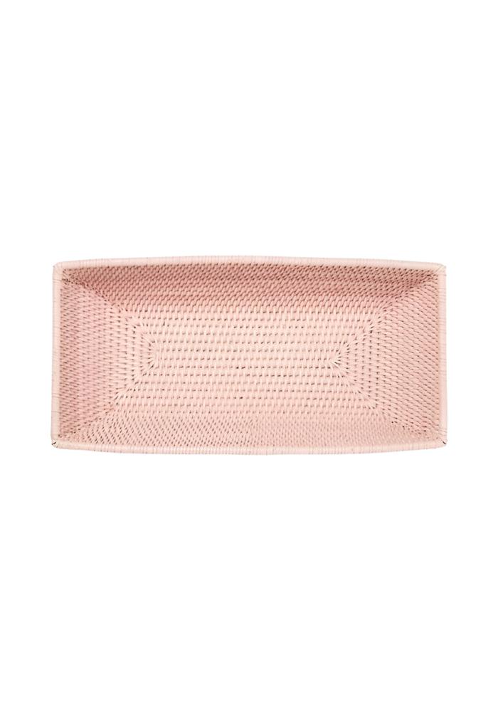A rectangular pink woven wiltshire long rattan basket with a textured interlaced pattern perfect for storage