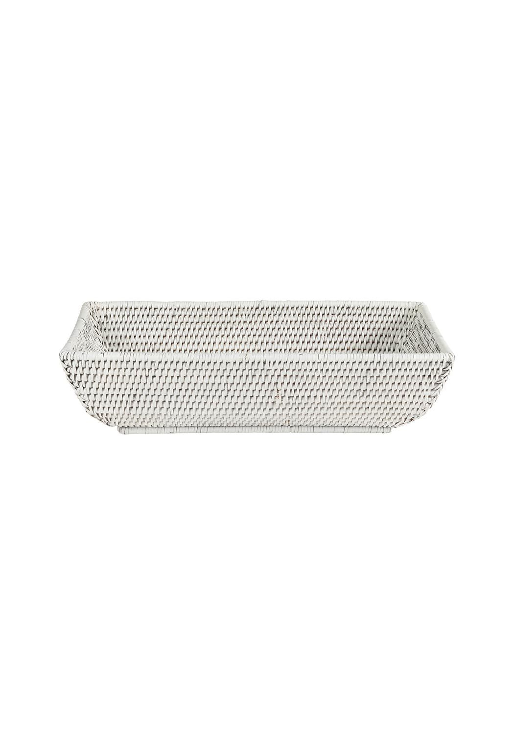White woven long rattan basket with tight uniform weave and slightly curved sides perfect for storage and decor