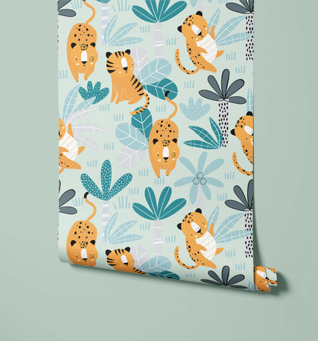 A roll of wimba light blue jungle-themed wallpaper with cartoon cheetahs tiger and green gray foliage