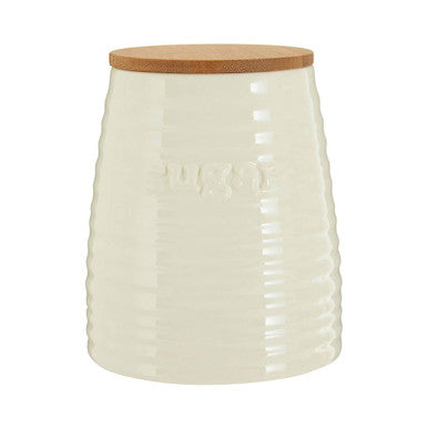Cream dolomite sugar canister with cream-colored ceramic body, natural wood lid, and vertical ribbed texture for storage