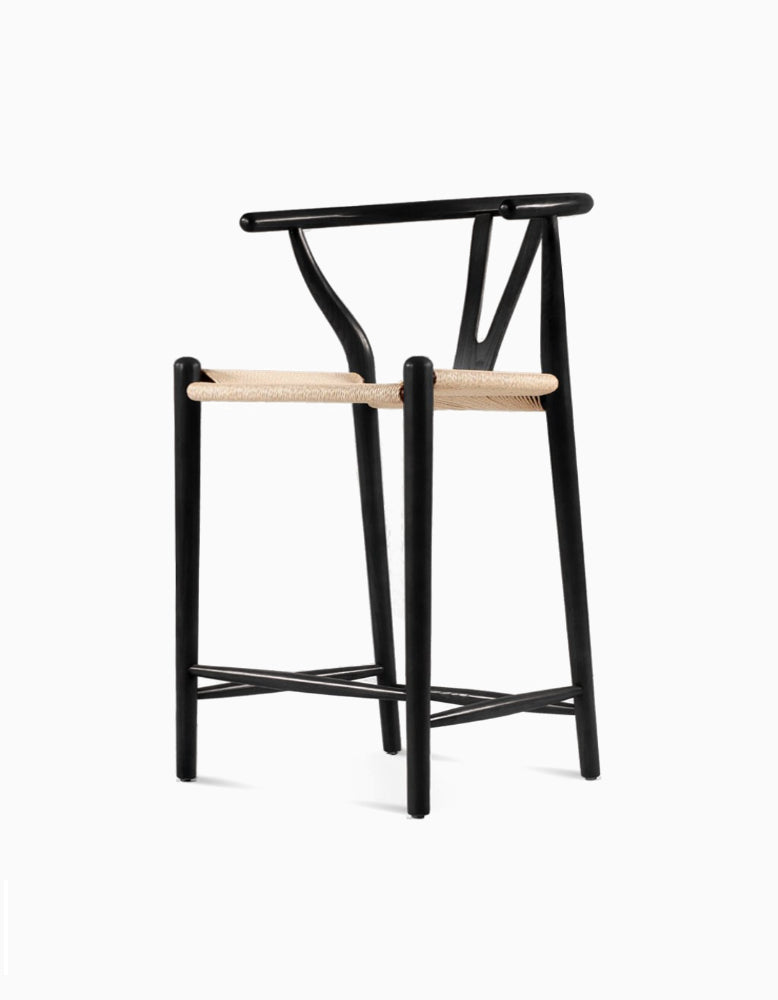 Black wishbone bar stool with light woven seat made of black ash perfect for stylish bar stools seating