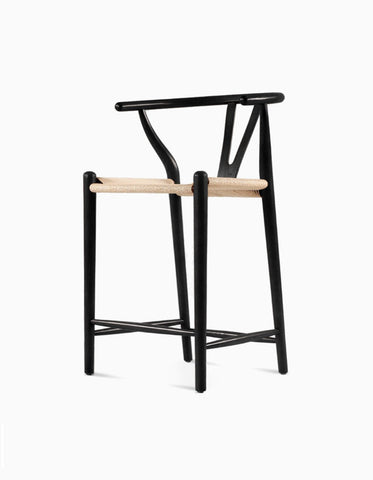 Black wishbone bar stool with light woven seat made of black ash perfect for stylish bar stools seating