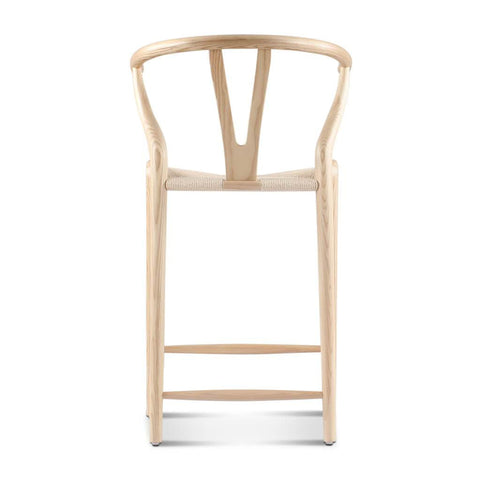 Light-colored wooden wishbone bar stool black ash with curved backrest and woven seat for stylish bar stools seating