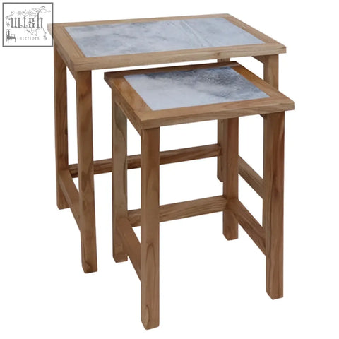 Nestled together womad large set of 2 wooden side tables with white marble tops and natural wood legs