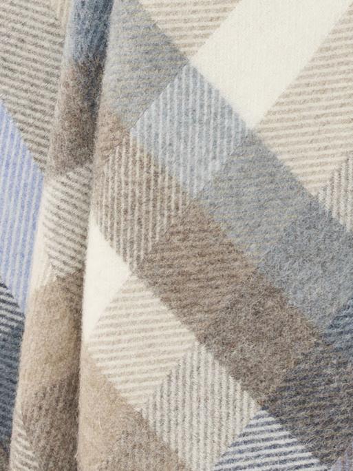 Woodale pure new wool shetland throw in blue with a soft textured geometric diagonal stripe pattern in muted tones
