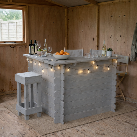 Gray painted wooden interlock corner bar with rustic log cabin design and string lights showing rustic character no tools required