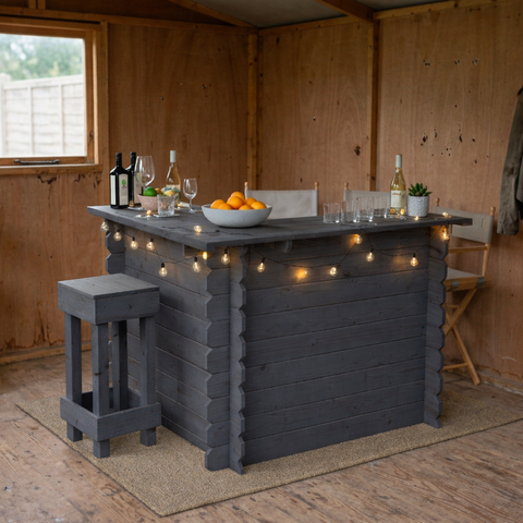 Dark gray wooden interlock corner bar with rustic character and string lights, tools required for assembly