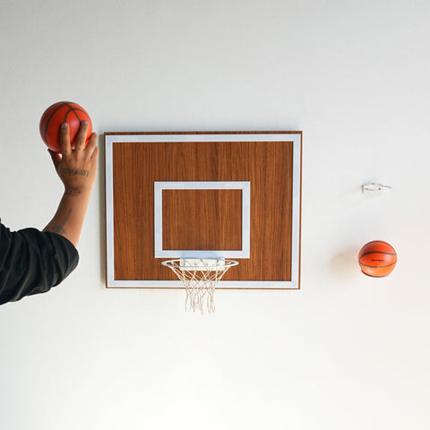 Wooden single hoop walnut wall-mounted basketball hoop with walnut backboard white rim and two orange spalding balls