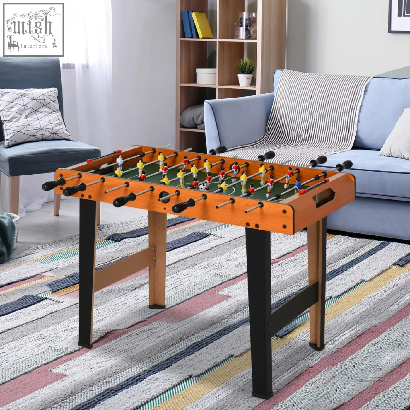 Orange wooden football table with black legs and colorful players for game room bar fun by HOMCOM