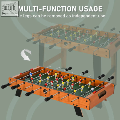 Wooden football table with orange finish black handles and colorful player figures perfect for game rooms and bars