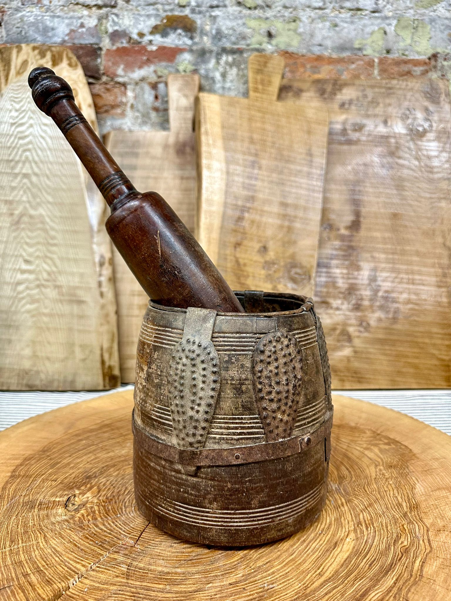 Antique wooden vintage herb plant pot with dark polished finish and intricate carved metal bands for desk tidy use