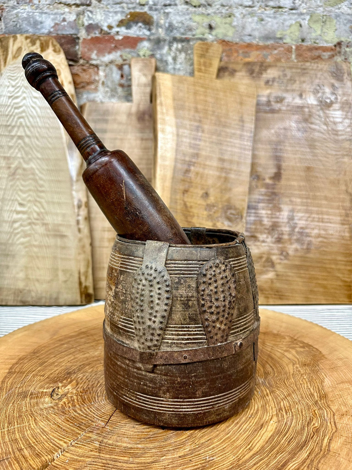 Antique wooden vintage herb plant pot with dark polished finish and intricate carved metal bands for desk tidy use