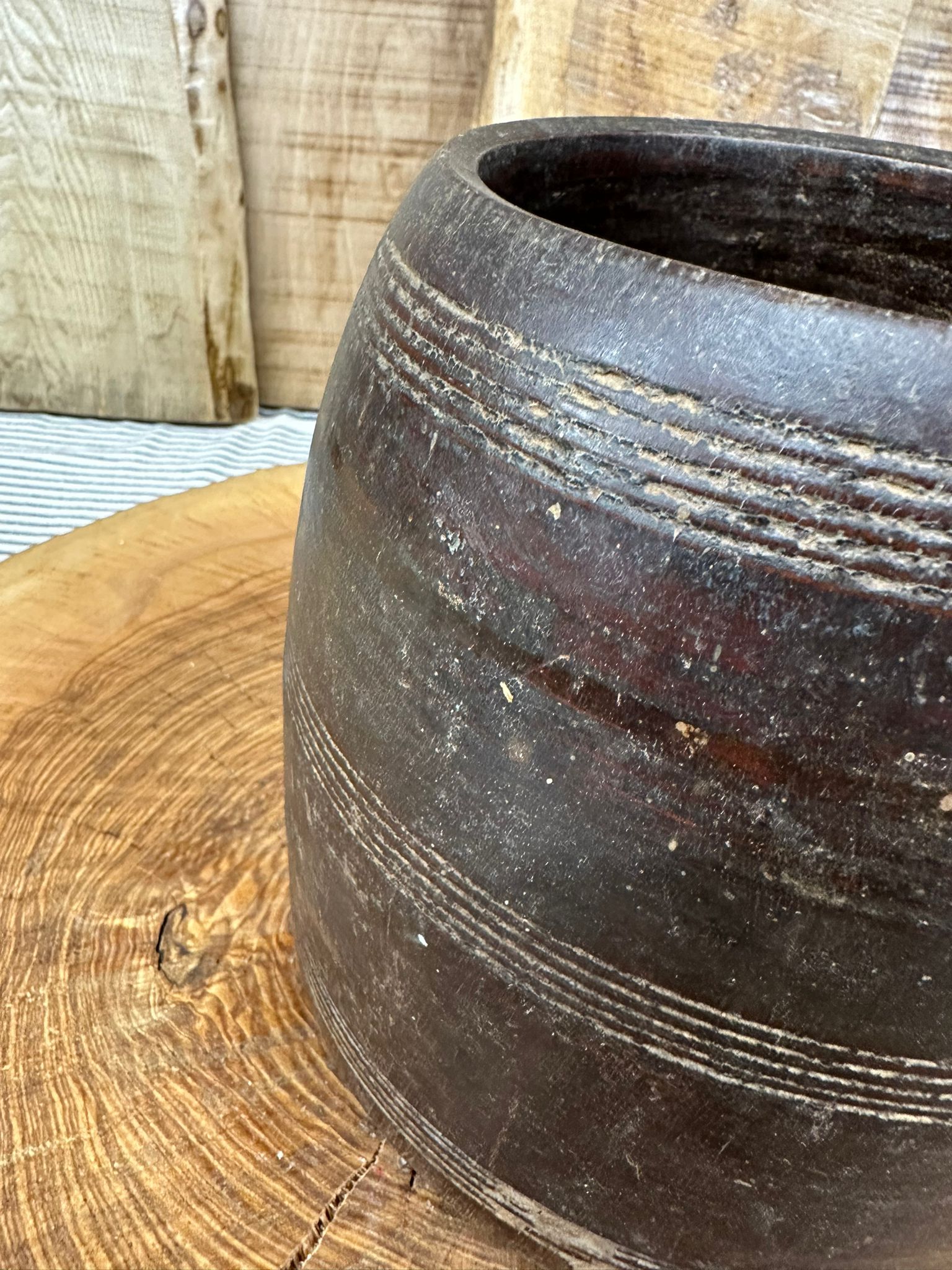 Dark weathered wooden vintage herb plant pot with hand carved ridges perfect as desk tidy or cutlery holder