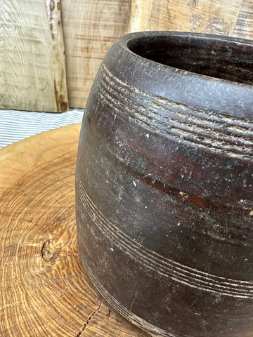Dark weathered wooden vintage herb plant pot with hand carved ridges perfect as desk tidy or cutlery holder
