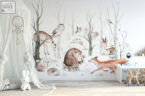 Whimsical woodland forest wall decals with deer foxes owls and hedgehogs in soft earthy tones for kids nursery walls