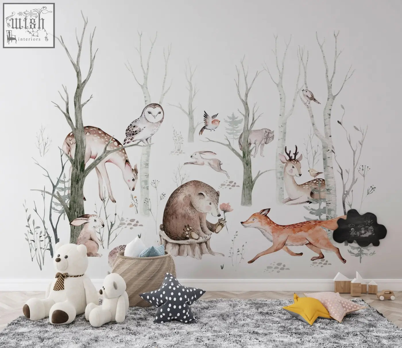 Whimsical woodland forest wall decals with hand-painted deer owls foxes and rabbits in soft earthy tones on gray wall