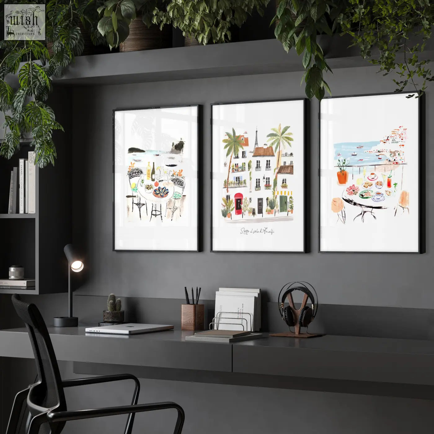 Three framed watercolor wall art of parisian and mediterranean scenes on a dark gray work office wall for office wall art