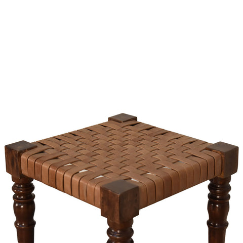 Brown leather wrapped woven footstool with dark wood legs made from solid mango wood chestnut finish